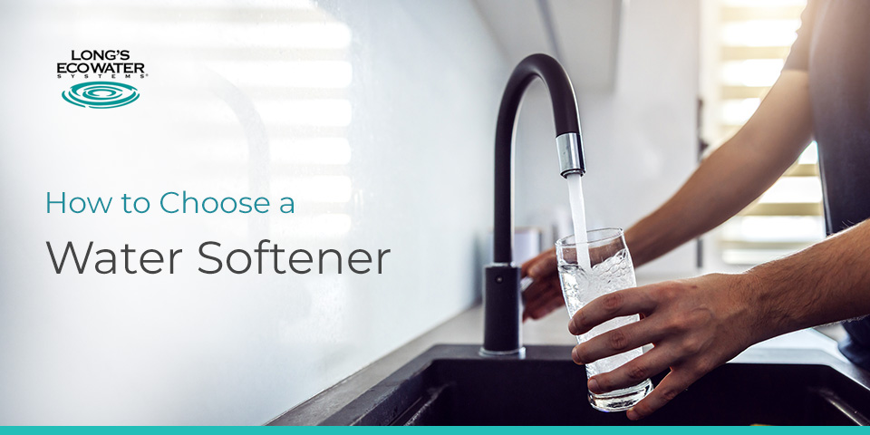 Man filling up water at sink