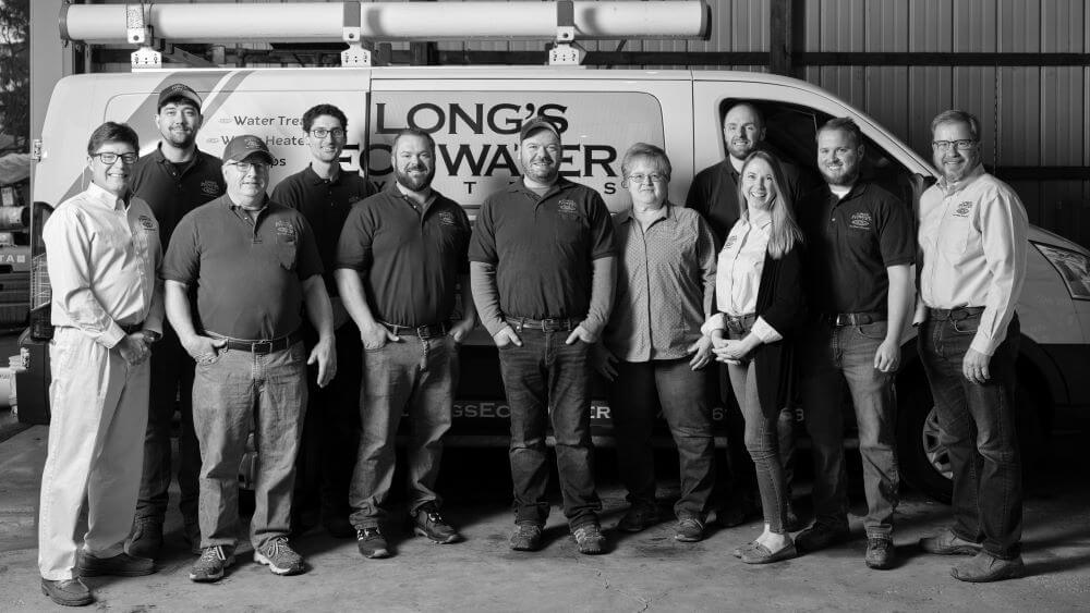 Long's EcoWater Team Photo Company photo in front of Long's EcoWater Van